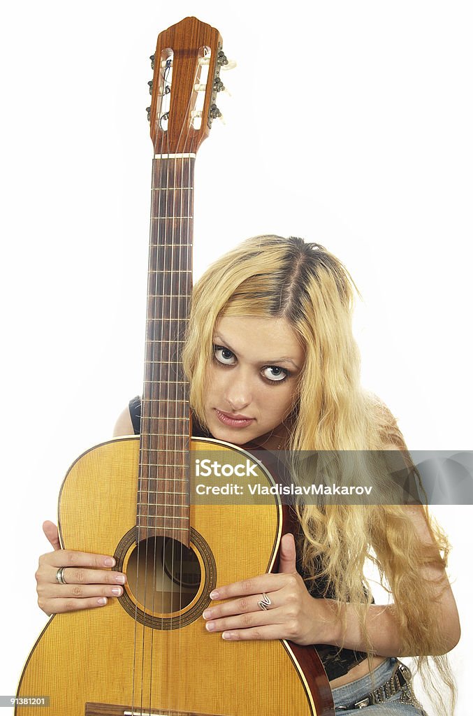 portrait of young woman with guitar closeup portrait of young woman with guitar 20-29 Years Stock Photo