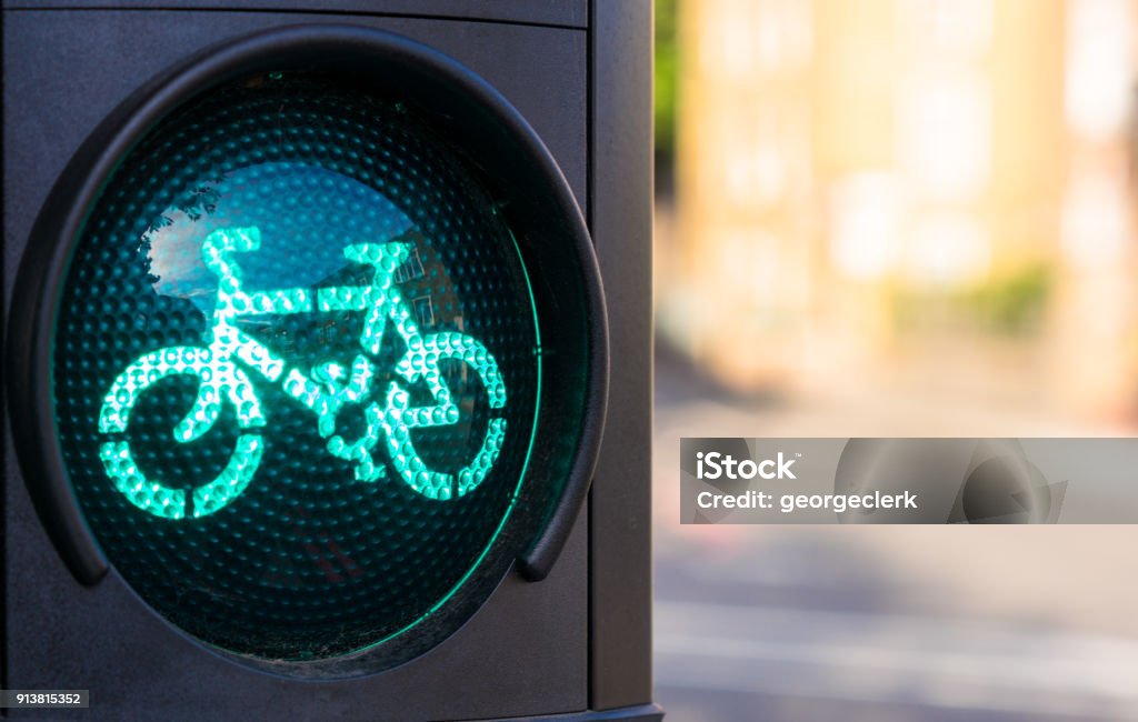 Green traffic light for cyclists Close-up of a green traffic light for cyclists. Bicycle Stock Photo