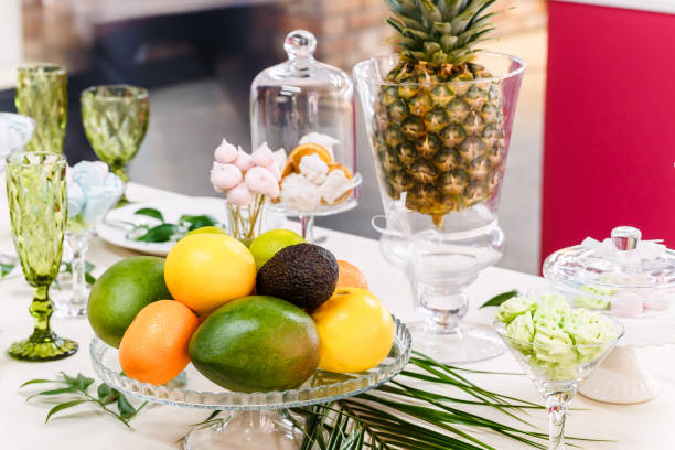 istock Festive table, decorated with vases, fruits and pastries. 913818846