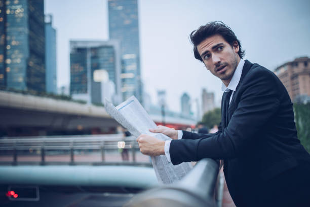 istock Gentleman reading the news 913823266