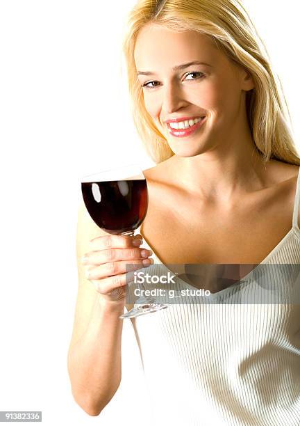 Joven Atractiva Rubia Feliz Sonriente Mujer Con Vino De Cristal Rojo Aislado Foto de stock y más banco de imágenes de Acontecimiento