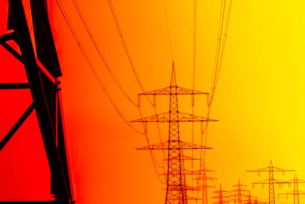 istock Electricity pylon and red and yellow sky 913823730