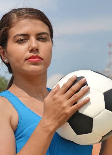 istock Serious Soccer Player Female 913834462
