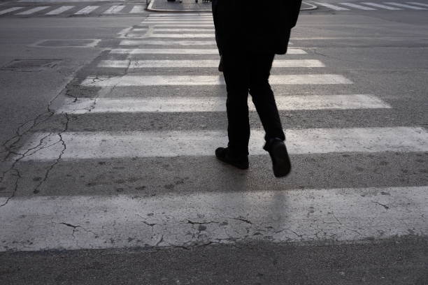 istock isolated person on the crosswalk 913837960