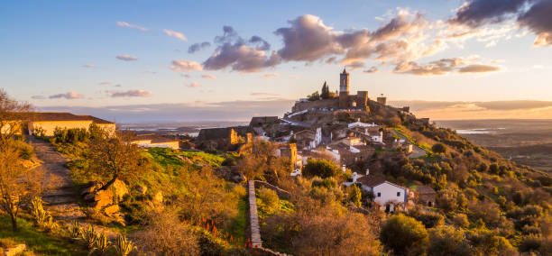 Monsaraz in Alentejo region, Portugal. Monsaraz in Alentejo region, Portugal, at sunset. road panoramic scenics journey stock pictures, royalty-free photos & images