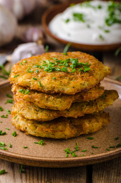 istock Potato pancakes with sour cream 913839108