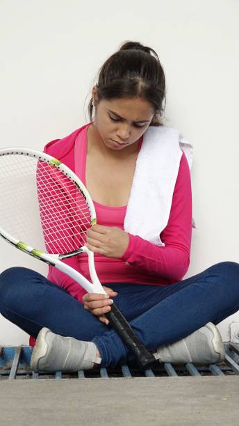 Beautiful Female Sad Tennis Player