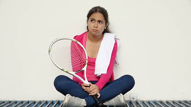 istock Pretty Female Sad Tennis Player 913839944