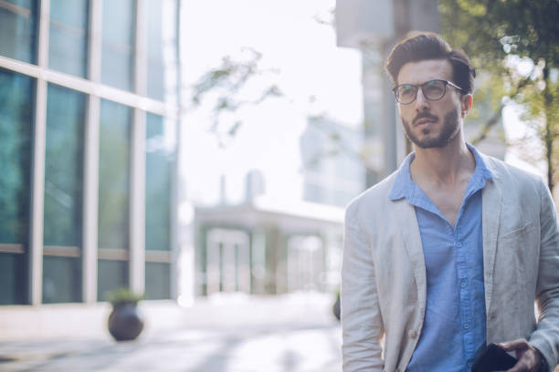 istock Charming young man in city 913842806