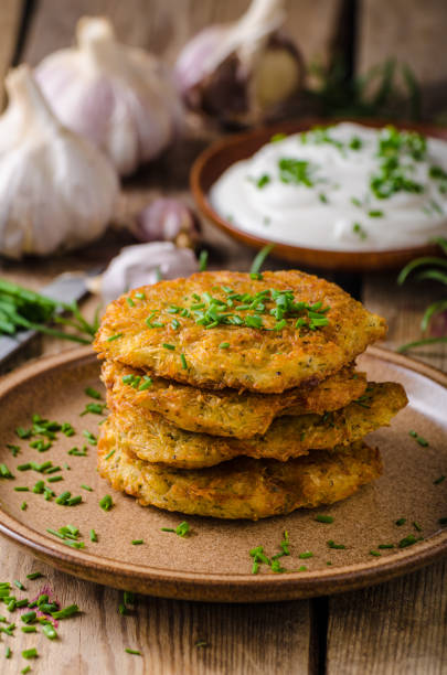 istock Potato pancakes with sour cream 913842810