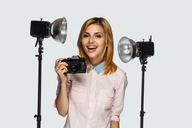 istock Blond female photographer. 913847402