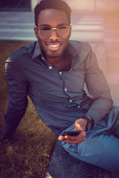 istock African american male using smartphone. 913850856