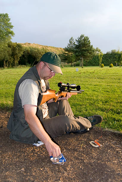 Man Loading Rifle 380+ Air Rifle Shooting Stock Photos, Pictures & Royalty-Free Images ...