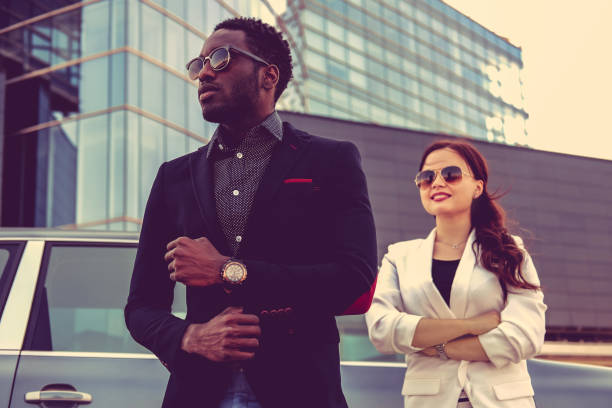 istock Modern black man and caucasian woman. 913865190