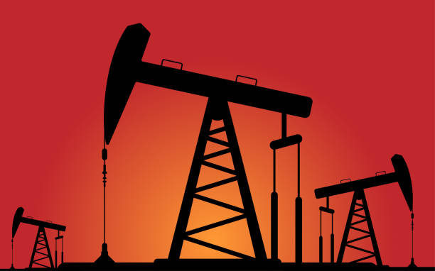 Working Oil Pumps Silhouette Against Sunset Working Oil Pumps, Pumpjack Silhouette Against Sunset, Dusk oil well stock illustrations