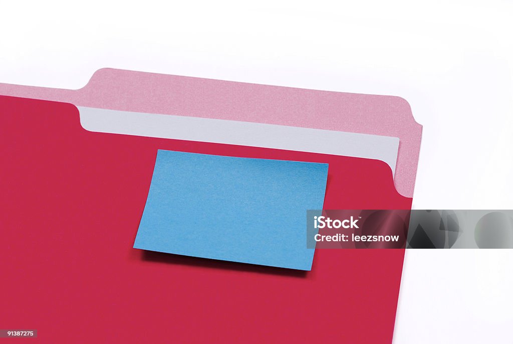 Red File Folder with A Blank Blue Sticky Note  File Folder Stock Photo