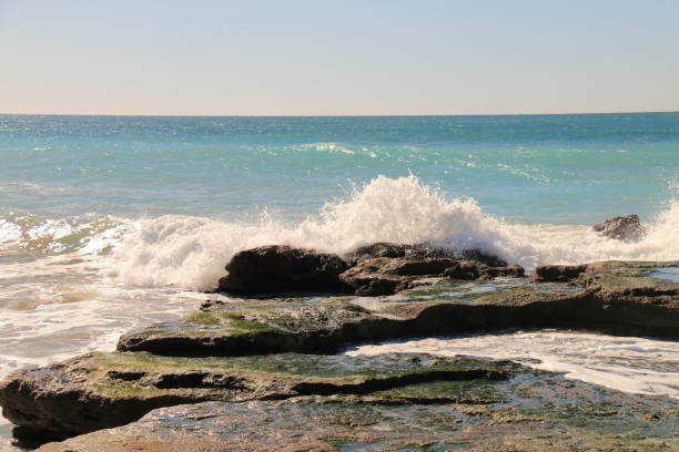 istock Waves crashing on the rocks at Cape Trafalgar 913872918