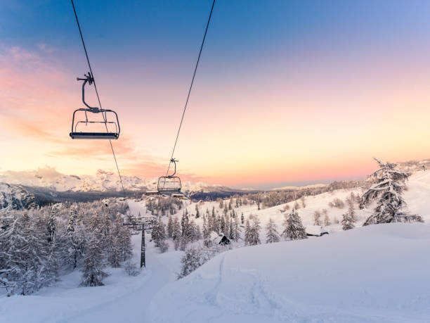 istock Winter mountains panorama with ski slopes and ski lifts 913873880