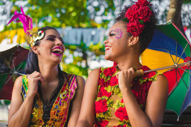 istock Dancers holding colorful umbrellas 913874164
