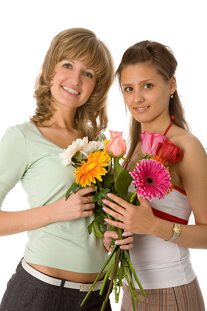 istock two women with flowers 91387553