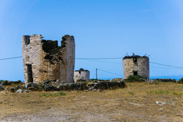 istock Old destroyed windmils at Kythnos island Greece 913880460