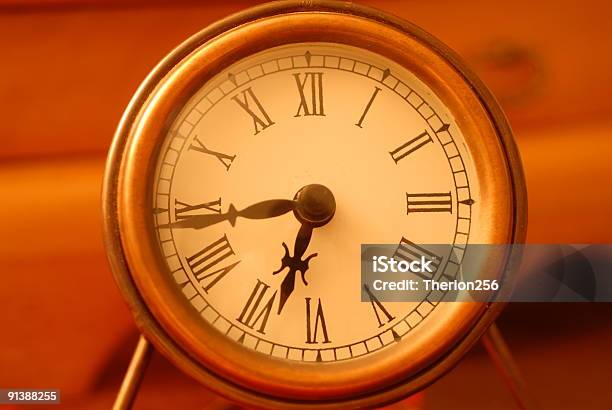 Small Desktop Clock With Roman Numerals Stock Photo - Download Image Now - Alloy, Brass, Clock
