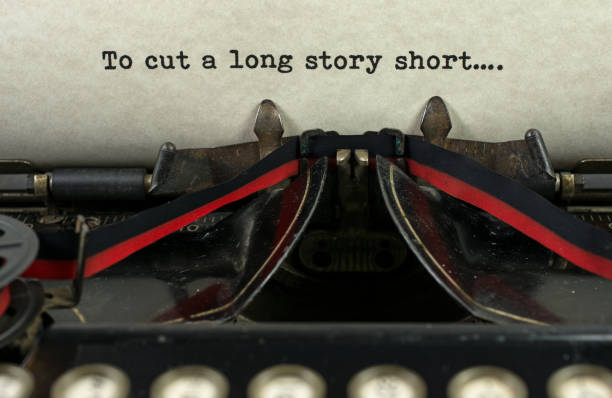 istock Antique typewriter with the words long story short 913884522