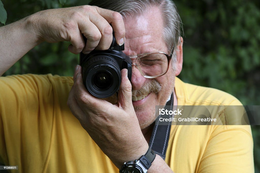 Homem levando uma fotografia - Foto de stock de Fotógrafo royalty-free