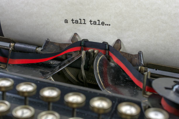 istock Antique typewriter with the words a tall tale 913886650