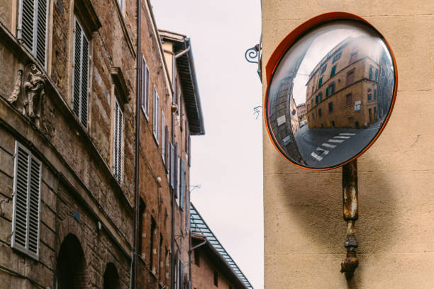 istock Reflector on empty rustic Italian street corner 913895084