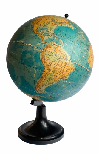 South America on an old globe isolated on the white background