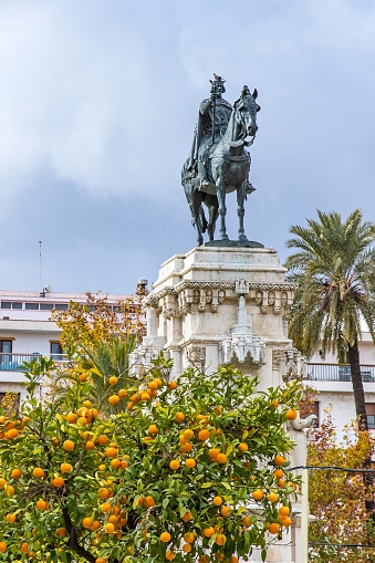 Monument to the Fernando III El Santo (Ferdinand III the Saint, King of Castile) on Plaza Nueva in Seville city, Andalusia, Spain