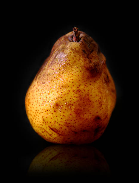 almost rotten pear  bruised fruit stock pictures, royalty-free photos & images