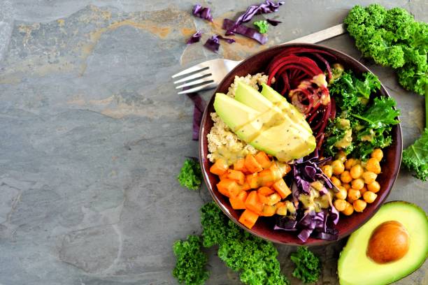 istock Healthy eating Buddha bowl on dark background. Top view, side border with copy space. 913903848