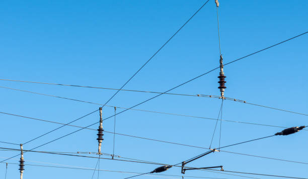istock Low Angle View Of Power Lines Against Clear Blue Sky 913906590
