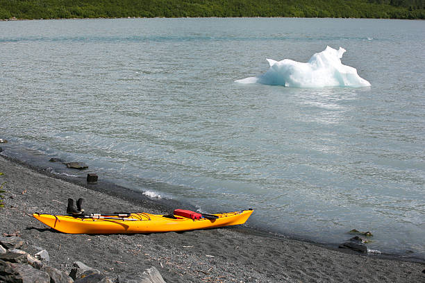 istock Glacier Lake with Iceberg and Kayak 91390699