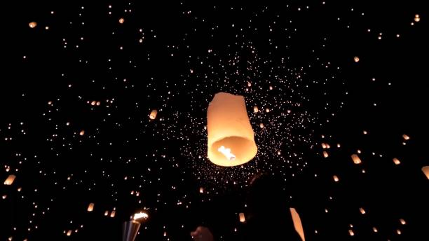 istock Low Angle View Of Illuminated Lighting Equipment Against Sky At Night 913917140