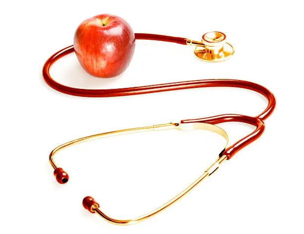 Photo of Stethoscope and apple