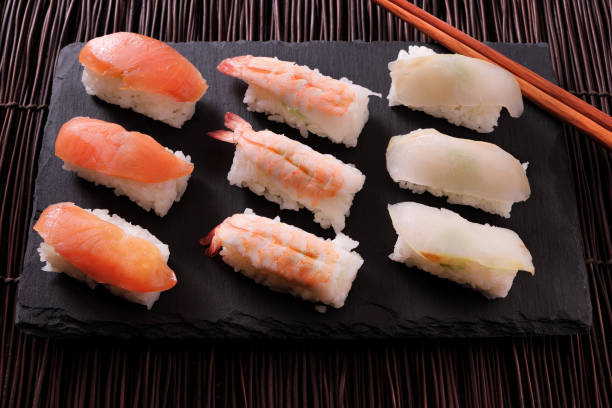 istock Japanese food sushi black slate chopsticks 913930920