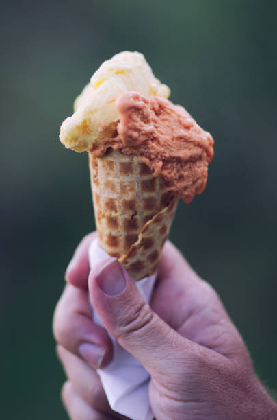 istock Hand Holding Cone of Authentic Italian Gelato 913931178