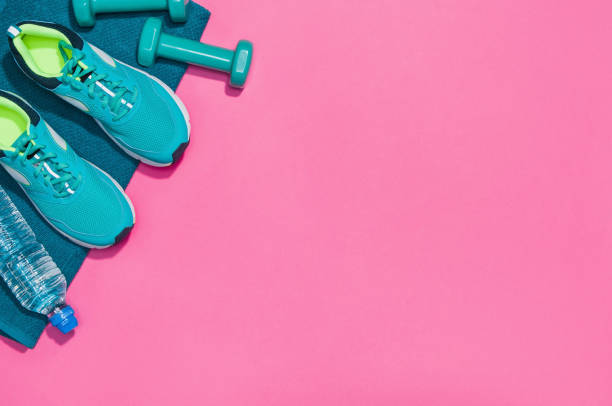 istock Fitness accessories on seamless background mock up, top view 913935812