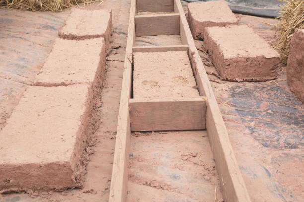 Hand made bricks with clay. Prepare mud for make bricks. Hand made bricks with clay. Prepare mud for make bricks. adobe oven stock pictures, royalty-free photos & images