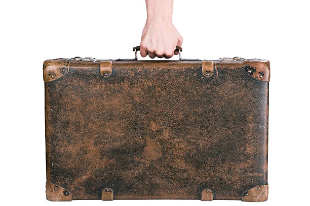 segurando uma velha mala - obsolete suitcase old luggage imagens e fotografias de stock