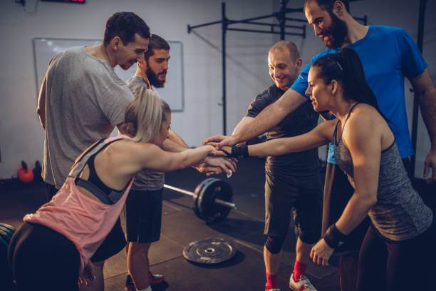 istock Group of Young People In The Gym 913940026