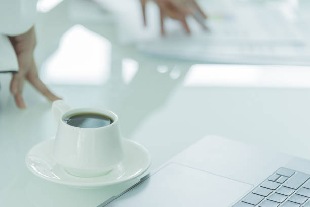 istock A coffee cup with white plate on the office desk. 913944248