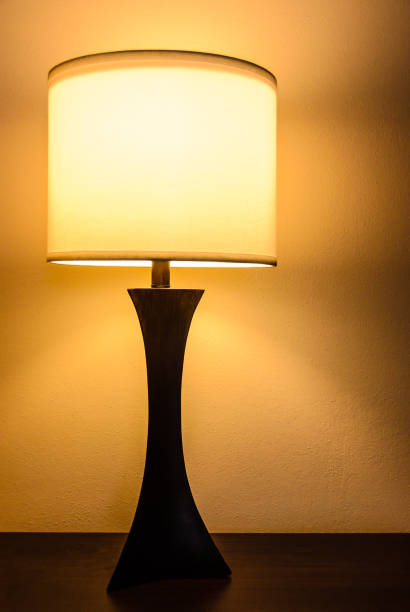 istock Bedroom table lamp in orange tones 913957320