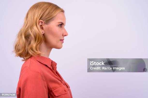 Portrait Of Beautiful Blonde Woman Stock Photo - Download Image Now - Women, Profile View, Side View