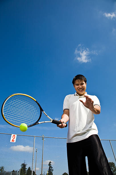 istock Asian tennis player 91395799
