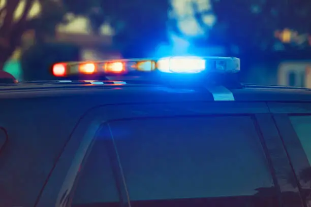 Eerie stock photos of a police car at twilight