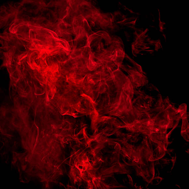 Red smoke over black stock photo